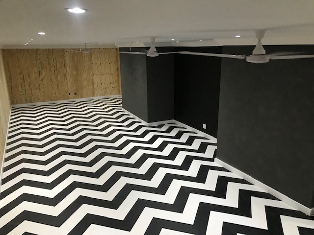 black and white herringbone flooring