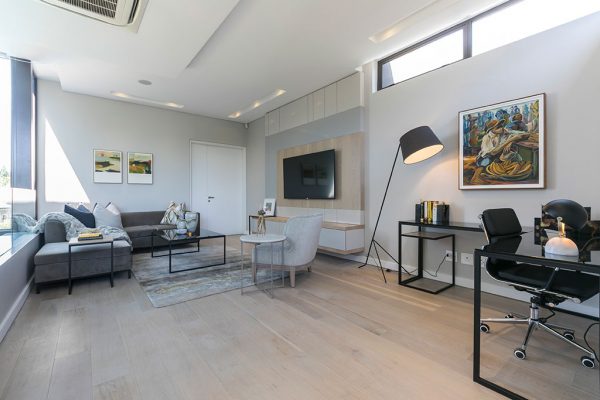 Light white washed Outeniqua flooring in a bedroom setting
