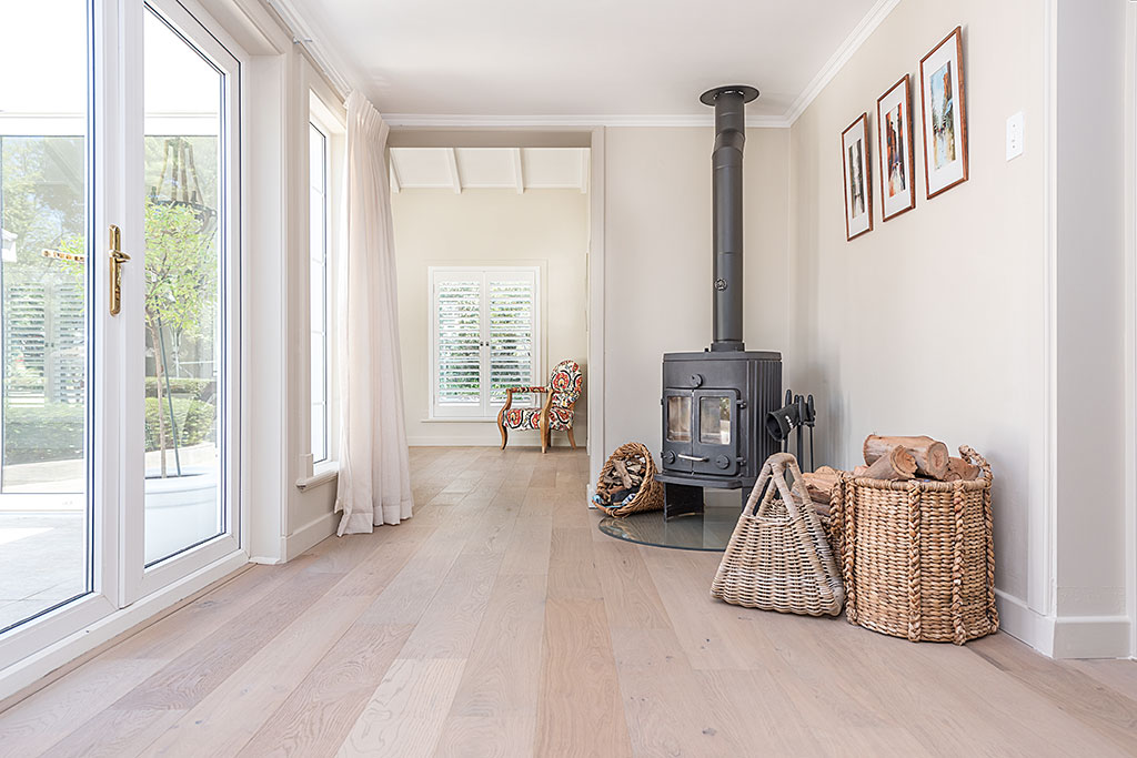 Pre finished Outeniqua wood flooring with a fire place