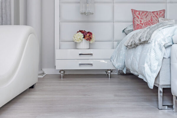 Light Alabaster diamond core vinyl flooring with white side table